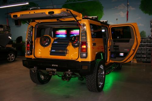 Yellow Hummer with flame decal