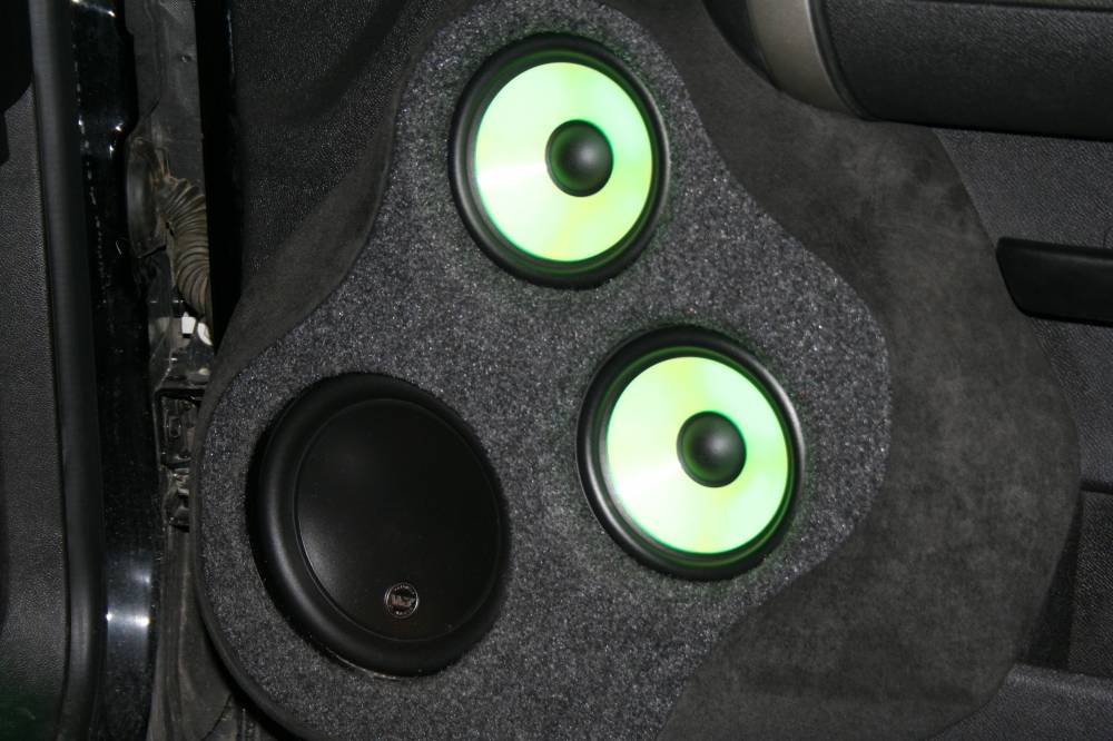 Speaker system and LED lights in the door of a car